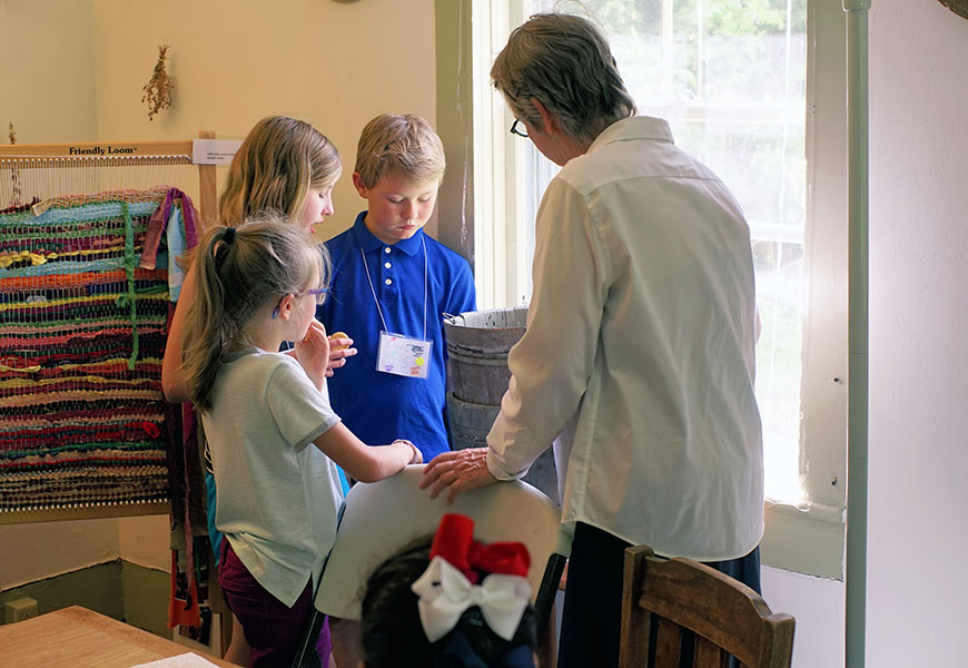 Students and teacher at the History Alive program at Enfield Shaker Museum in Enfield, New Hampshire.