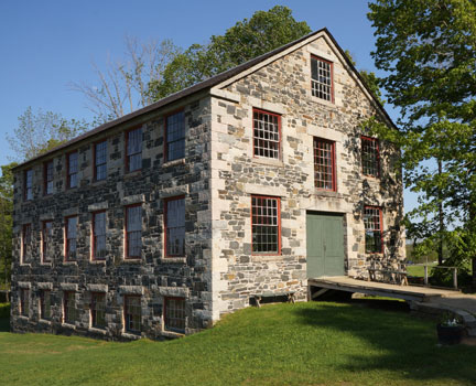 Southeast view of the Stone Mill at Enfield Shaker Museum, Enfield, New Hampshire.