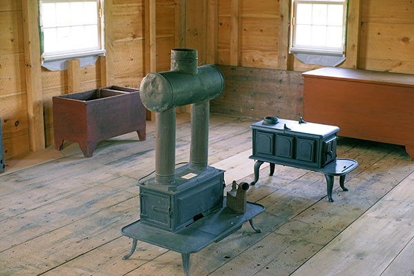 Stoves and wood boxes displayed in the East Brethren's Shop