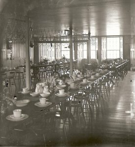 Historic view of dining room of the Great Stone Dwelling