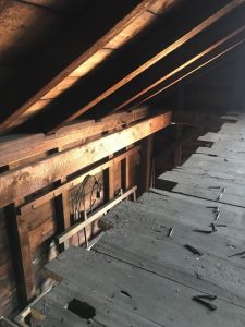 Laundry attic with boards removed. Enfield Shaker preservation.