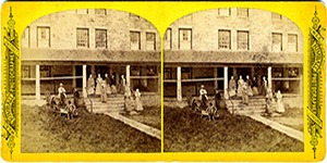 Stereoview at Enfield, NH Shaker Village - Veranda of the Stone Dwelling House.