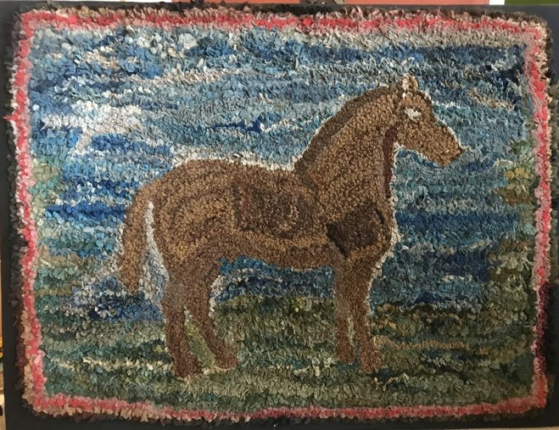 Rug depicting a horse