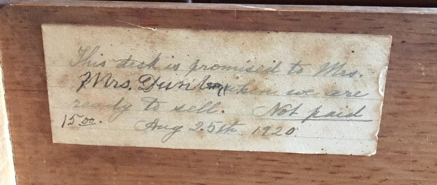 Photo of label glued inside a drawer of the red work desk (2021.12.1).